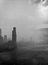 Buildings in city against sky