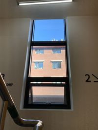 Low angle view of window on wall of building