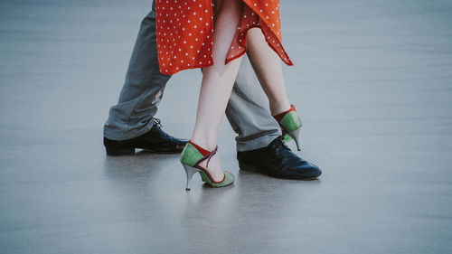 Low section of couple on floor