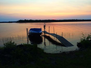 Scenic view of sunset over calm lake