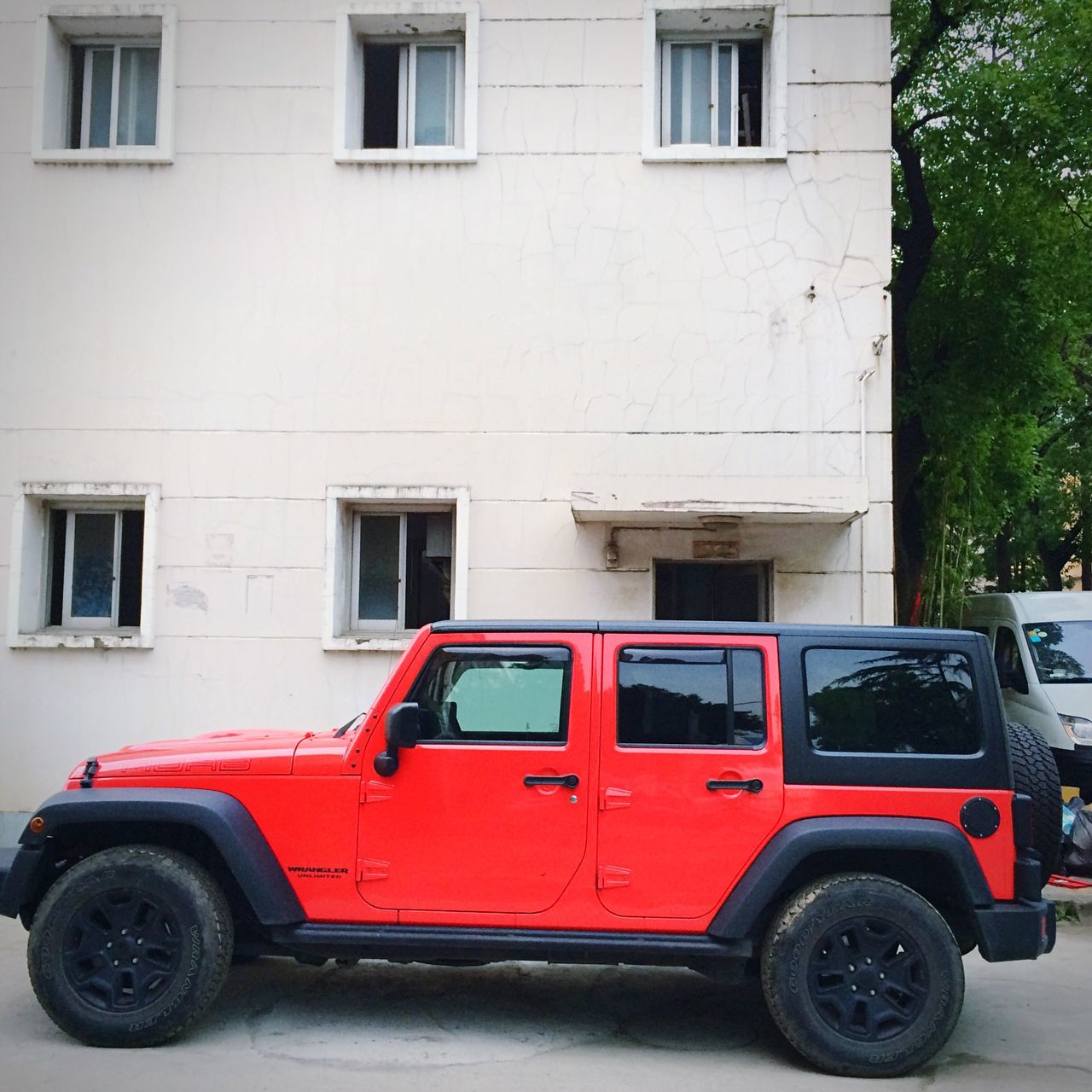 land vehicle, transportation, mode of transport, stationary, parked, red, parking, day, outdoors, no people, city life