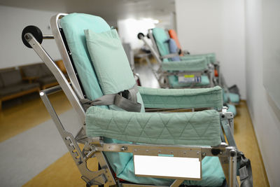 Close-up of wheelchairs in hospital