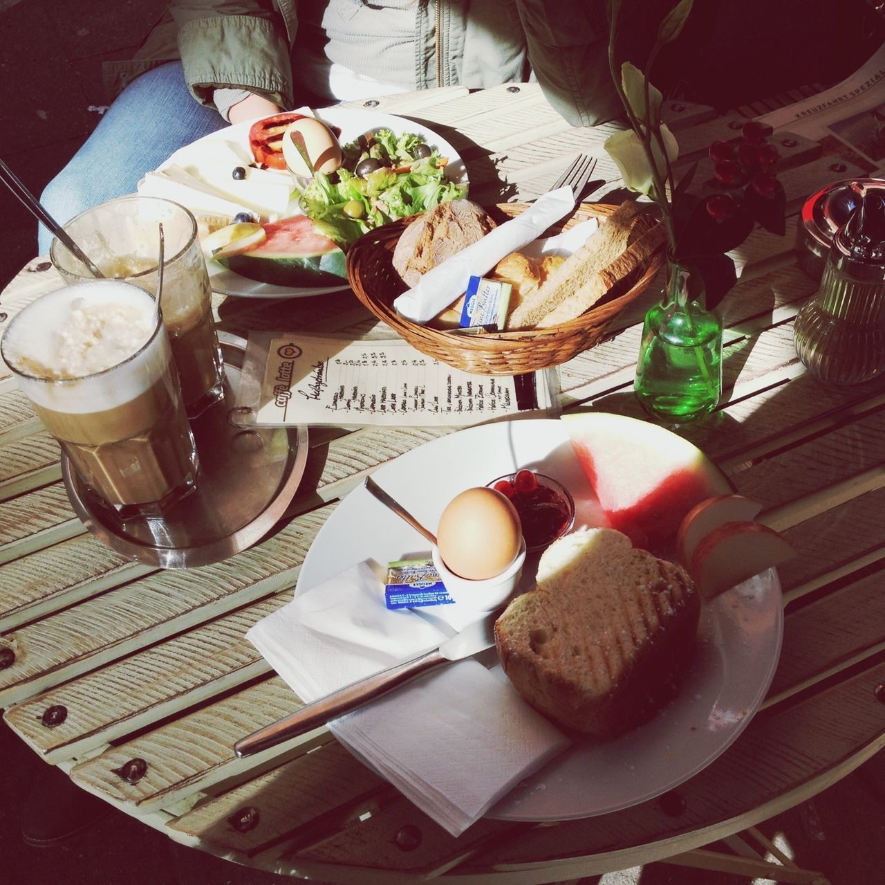 food and drink, table, freshness, indoors, food, plate, ready-to-eat, drink, still life, high angle view, healthy eating, serving size, restaurant, refreshment, indulgence, drinking glass, bowl, meal, spoon, bread