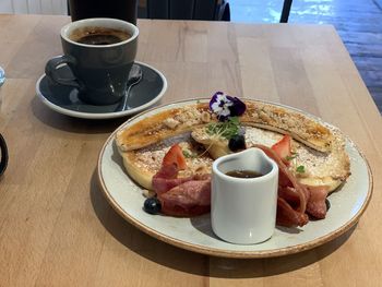 Close-up of breakfast served on table