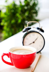 Close-up of coffee cup on table