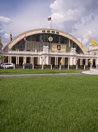 View of soccer field against cloudy sky