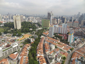 High angle view of buildings in city against sky