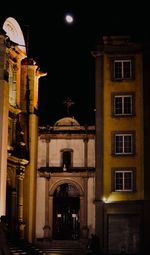 Low angle view of illuminated building at night