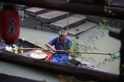 Man working in boat