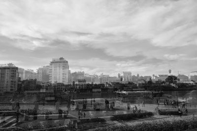 High angle view of buildings in city against sky