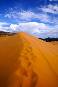 Scenic view of desert against sky