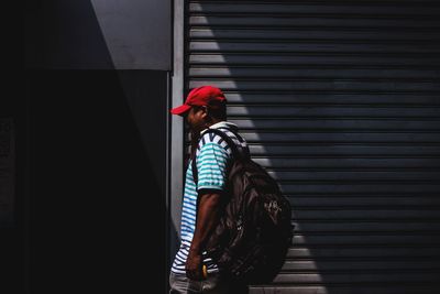 Rear view of boy working