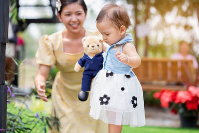 Mother and daughter outdoors