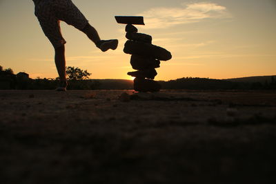 Silhouette of man at sunset