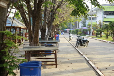 Footpath by street in city