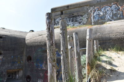 Close-up of old ruins against sky