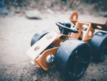 Close-up of toy car on road