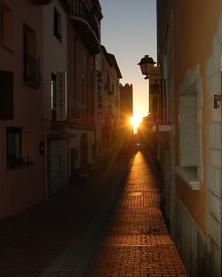 Sun shining through building
