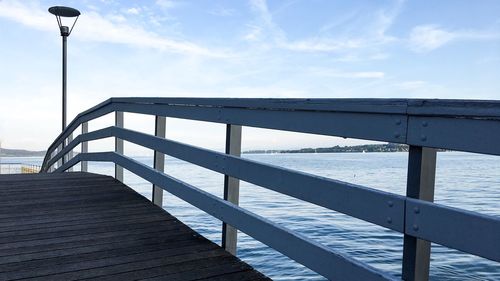 Pier on sea against sky