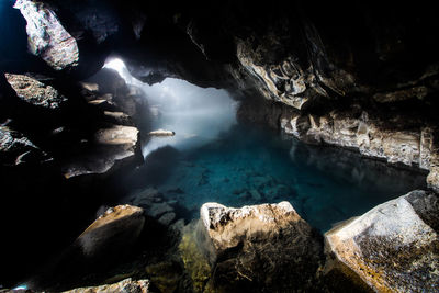 High angle view of rocks in sea