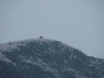 Low angle view of mountain against clear sky