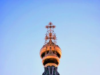 Orthodox dome - ornate, golden peak, which shines in the evening sun