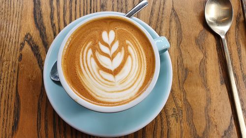 High angle view of cappuccino on table