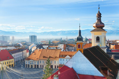 View of buildings against sky in city