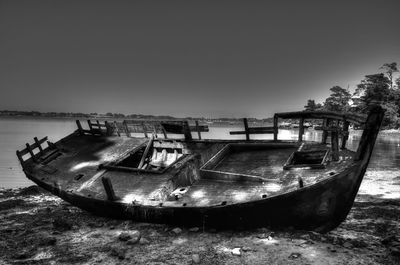 Abandoned boat in sea