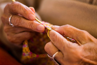 Close-up of woman knitting