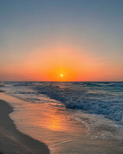 Scenic view of sea against sky during sunset