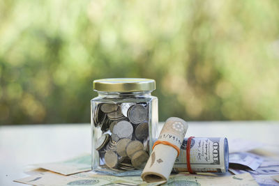 Close-up of coins on table