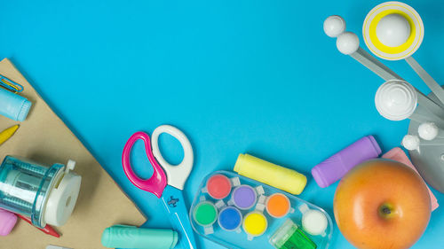 Directly above shot of school supplies on table