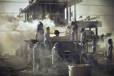 People working in factory