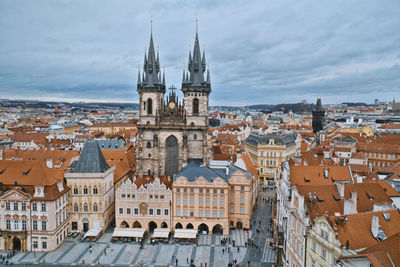 View of buildings in town against sky