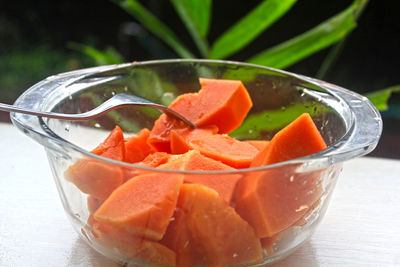 Close-up of fruits in glass on table