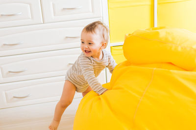 Cute boy smiling at home