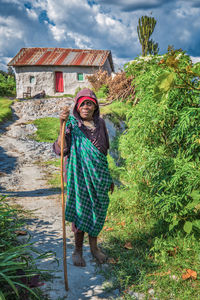 Portrait of woman standing outdoors