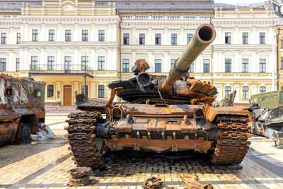 Destroyed rusty russian tank on display in the city square for viewing. kyiv, ukraine.