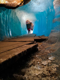 Man standing in tunnel