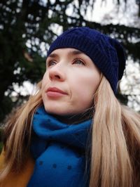 Close-up of woman wearing knit hat