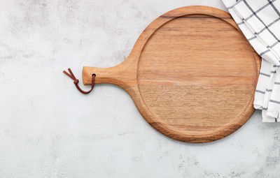 High angle view of face on table against white background