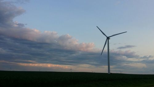 Wind turbines on field