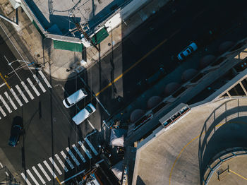 High angle view of buildings by road in city