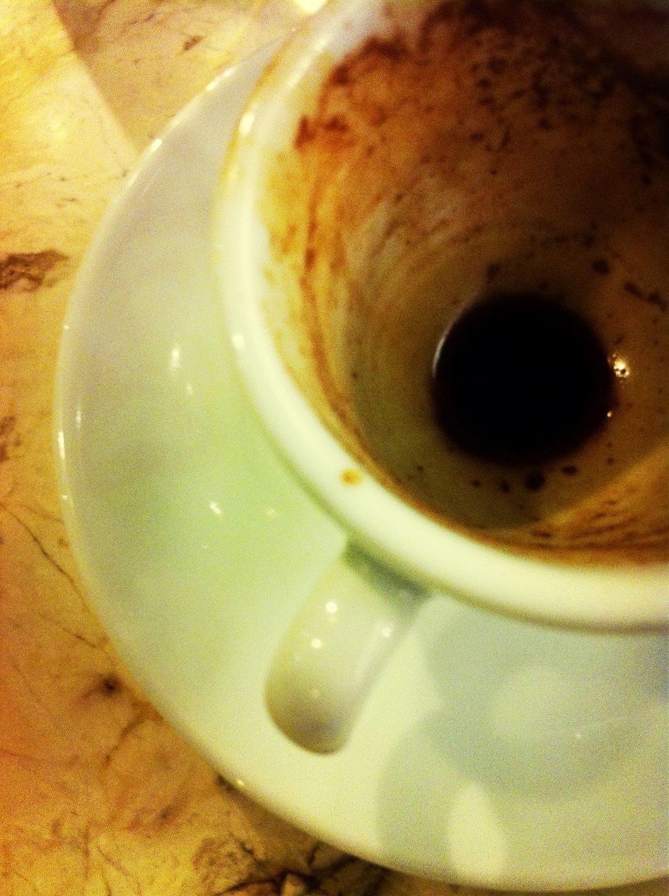 indoors, food and drink, drink, refreshment, close-up, still life, coffee cup, table, high angle view, freshness, coffee - drink, directly above, saucer, spoon, cup, circle, frothy drink, coffee, selective focus, cappuccino