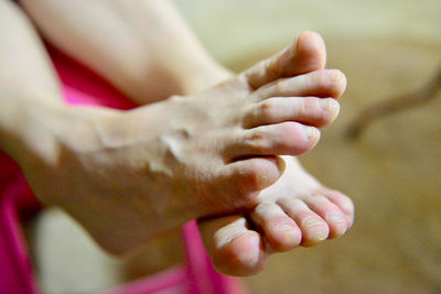 Close-up of hand holding hands