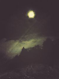 Scenic view of landscape against sky at night