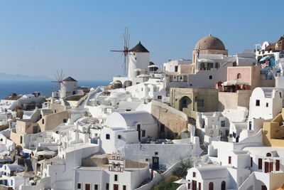 View of town against blue sky