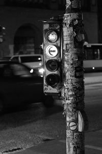 Close-up of car on street at night