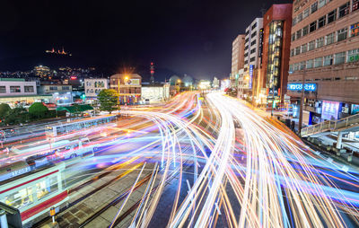 Light trails on city street at night